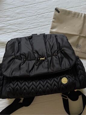 Black Quilted Women's Backpack with Gold Accent